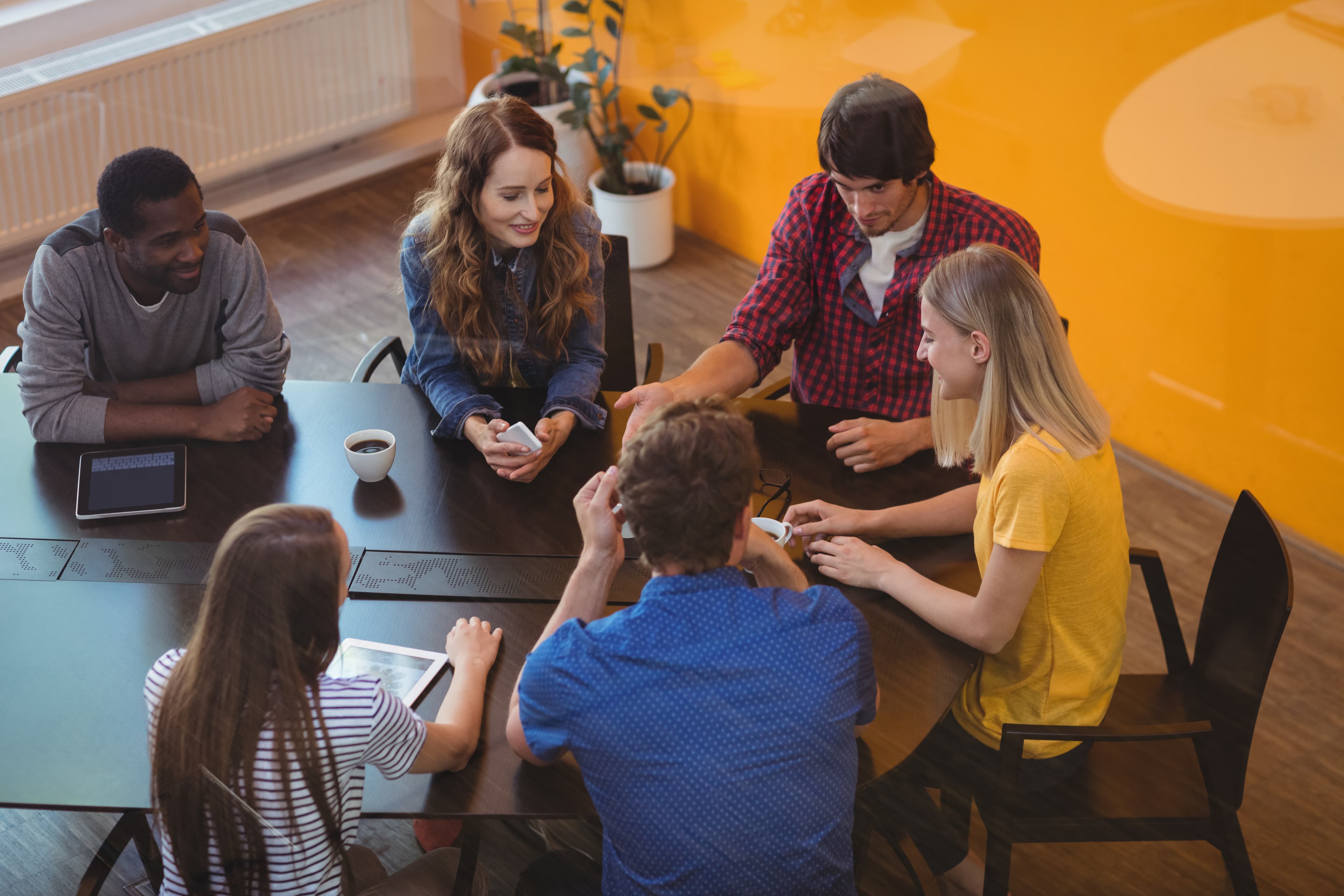 Team collaborating around a table